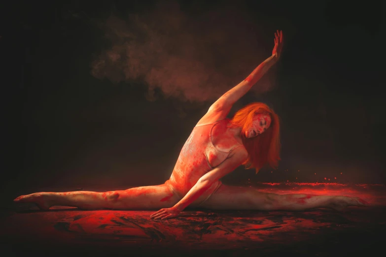 a woman's  body covered in red wax