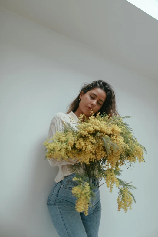 there is a girl with a bouquet of flowers