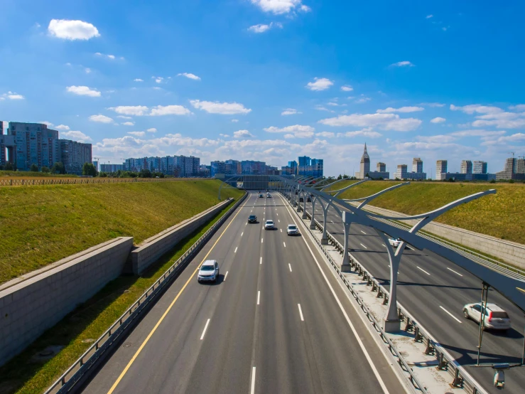 cars and trucks traveling on an empty highway