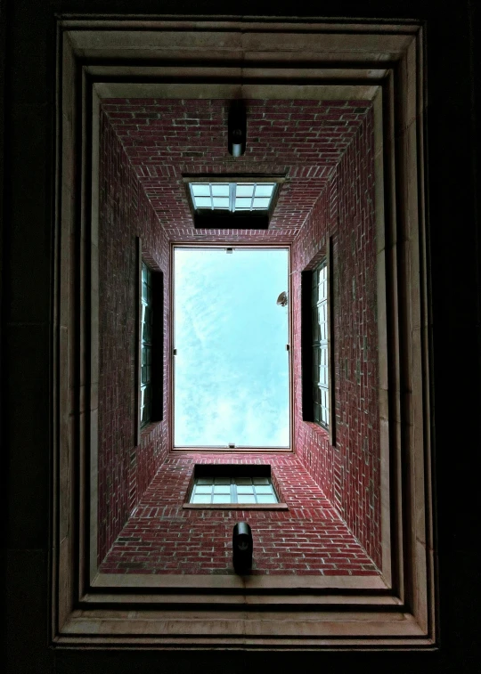 an abstract po of a brick building with two square windows
