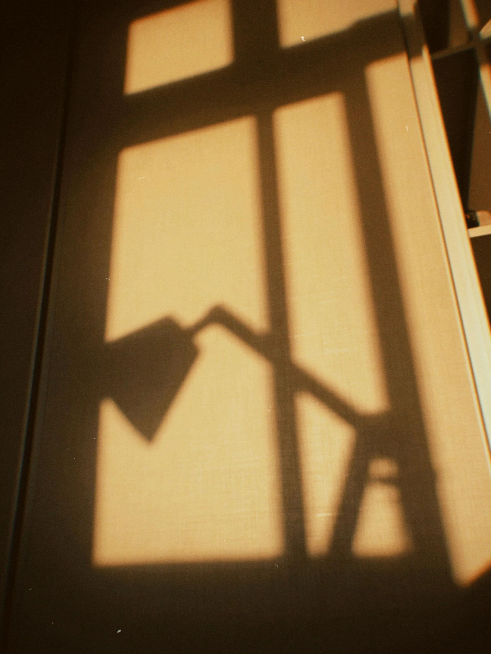 there is an image of shadow of a lamp