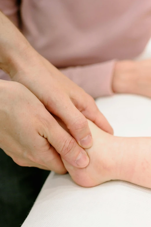a person's foot being measured with a  test