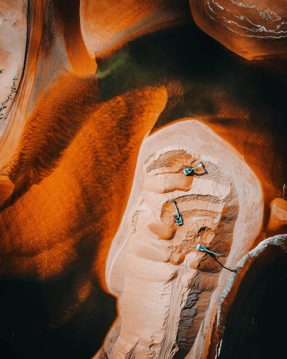 the view from above of rocks and water