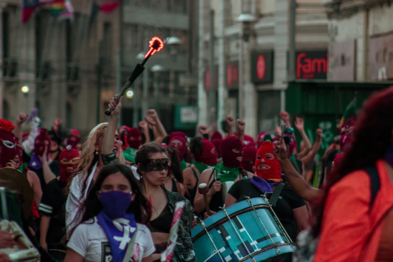 there is a band playing for people in a crowd