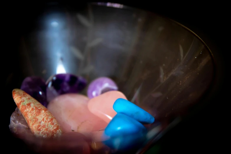 there are pills in the bowl, including one that has been placed on top