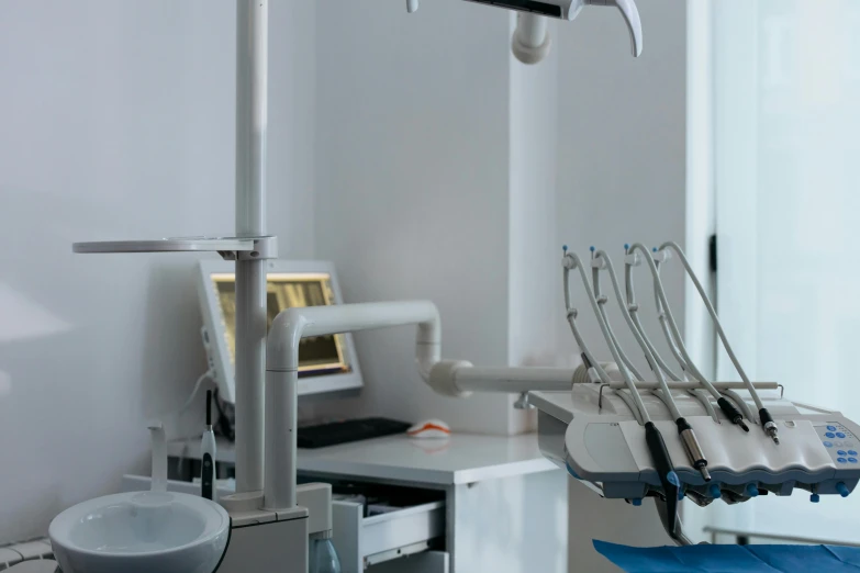 dental equipment hanging from ceiling in room