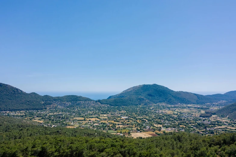 view of the mountains from top of a hill