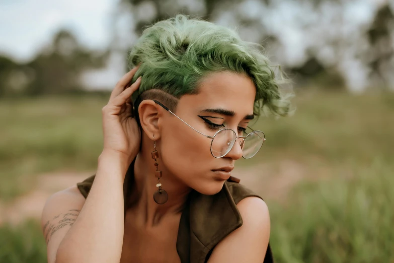 an image of a woman with green hair