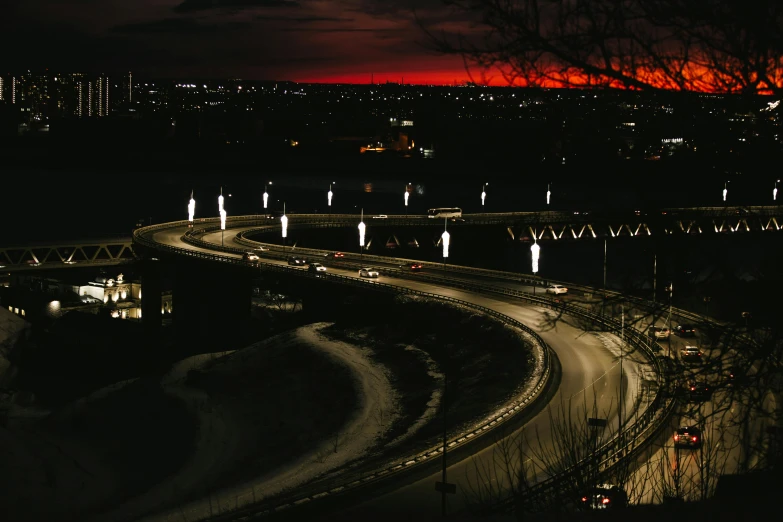 night time picture of a bridge with lights