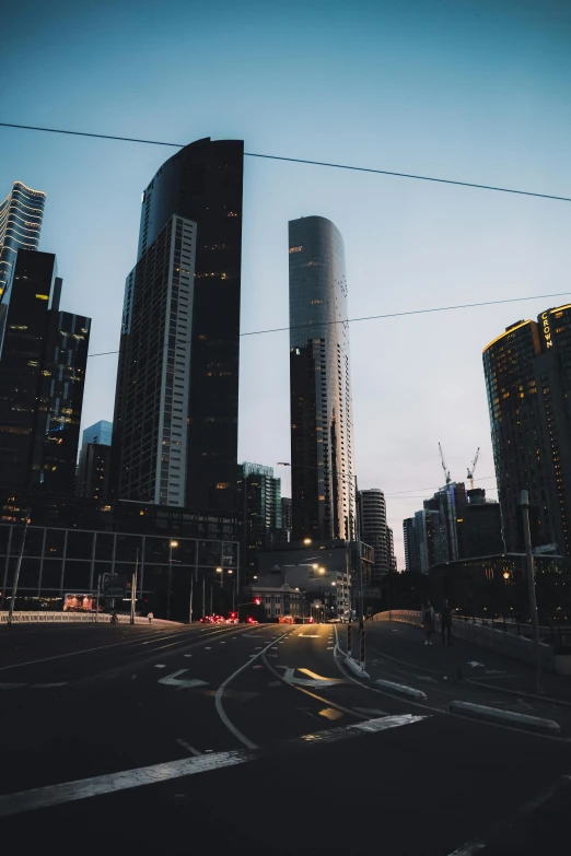 a couple of very large building towering over a city