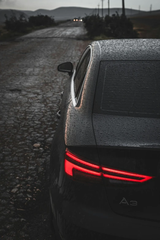 a close up of a car parked in the road