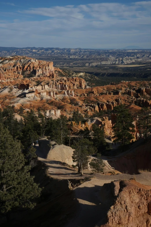 a mountain landscape covered with rocks and trees