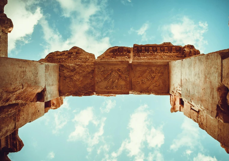 a large arch is open into the sky