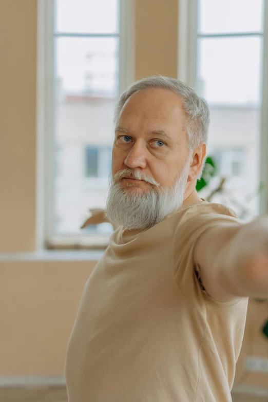 an old man with a beard and white hair