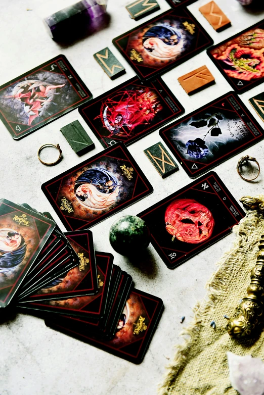 the contents of a tarot card game spread out on a table