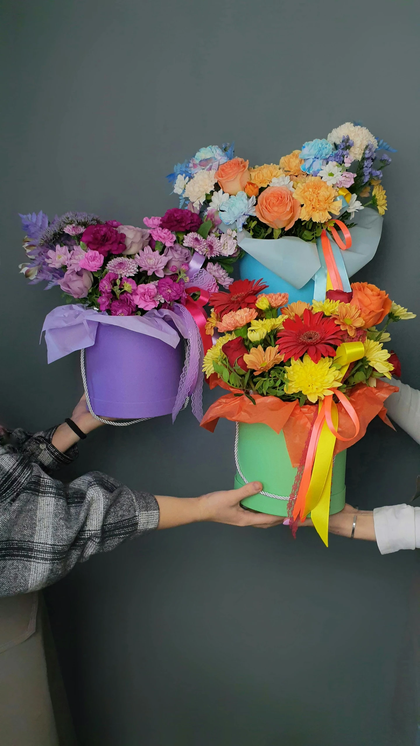 a large bouquet of flowers sitting on top of a white chair