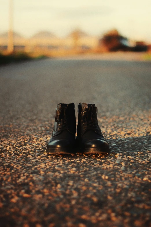 shoes are seen on the ground on a sunny day