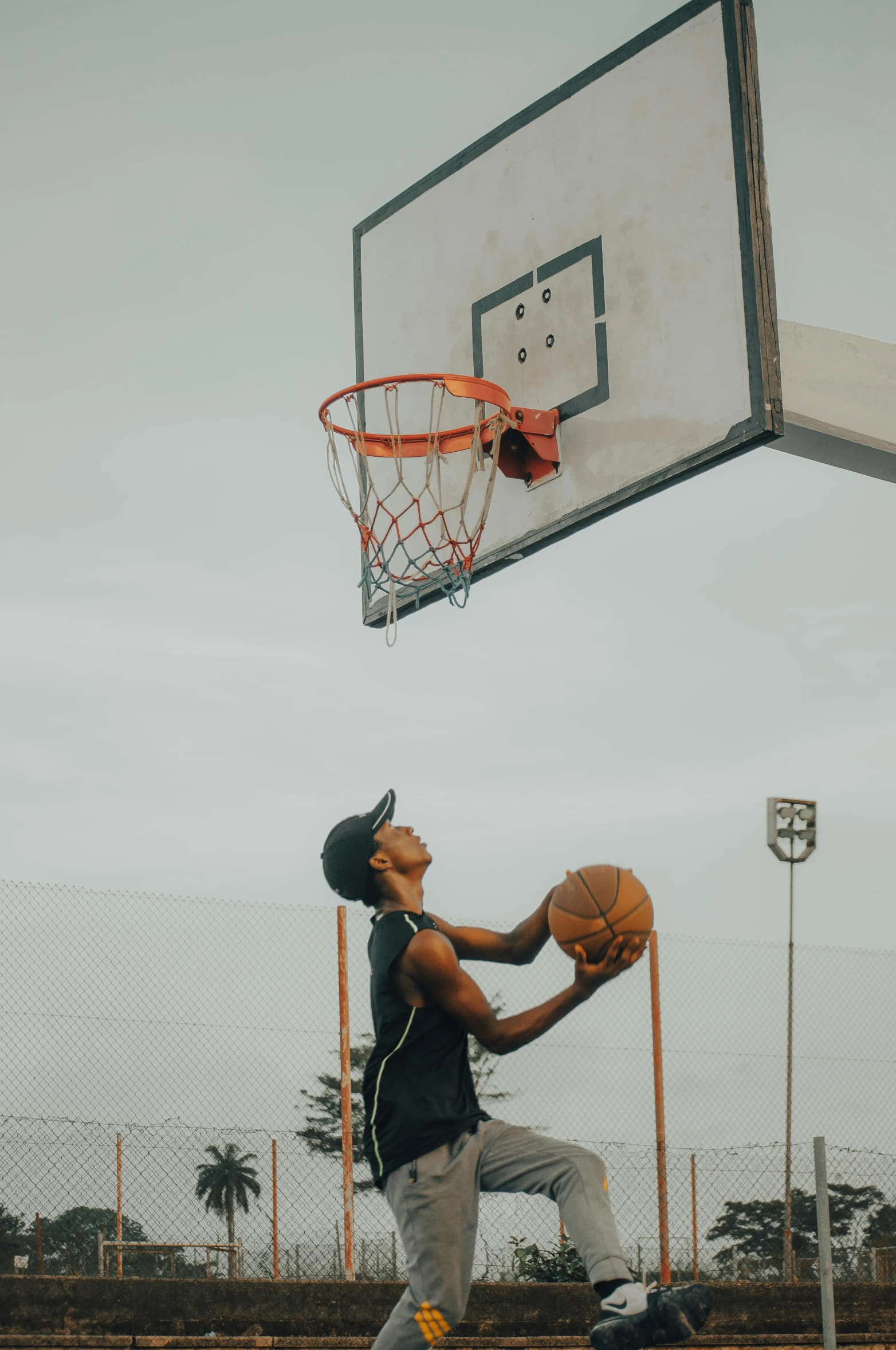 the basketball player is playing with his ball