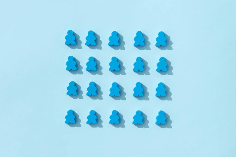 a group of small blue people placed in the shape of a box