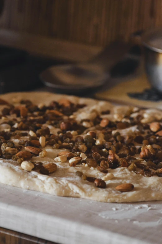 there is a whole pizza on the cookie sheet