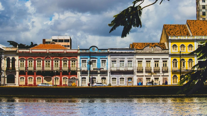 colorful buildings along side a body of water