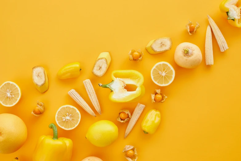 an overhead view of various citrus fruit and vegetables