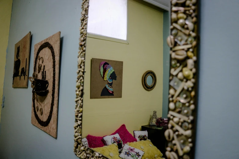 a view of a bathroom through the mirror