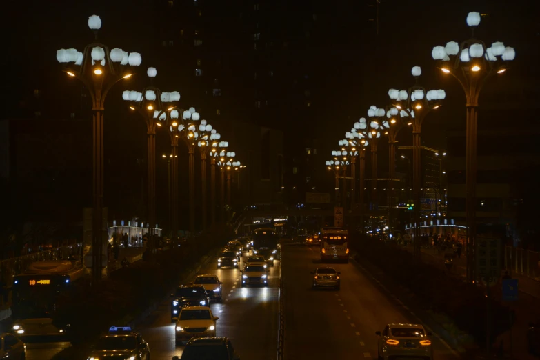 traffic driving in opposite directions in a city at night