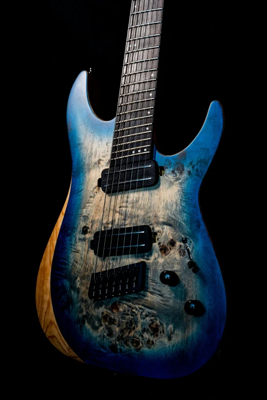 an electric guitar is shown against a black background