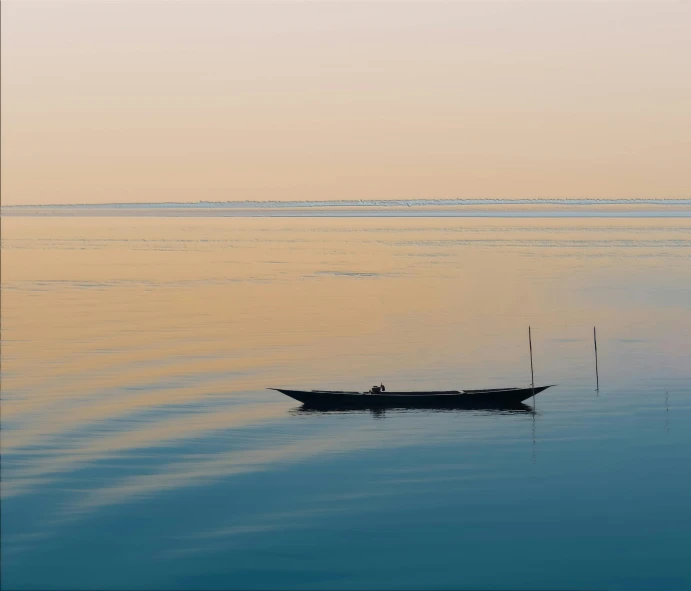 the lone boat is out on the water