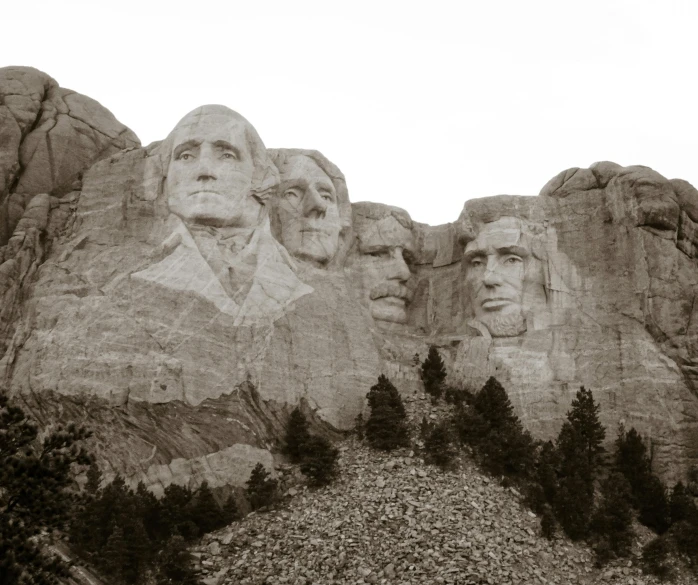 the face of mount rush is carved into some mountains