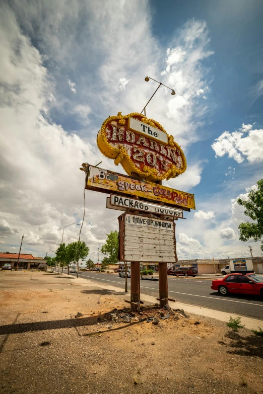 a sign is sitting in the middle of the street