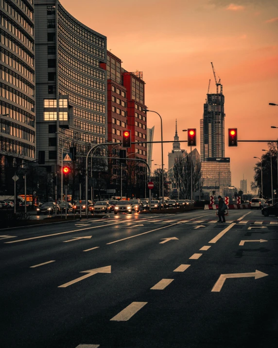 city traffic at dusk in an urban setting