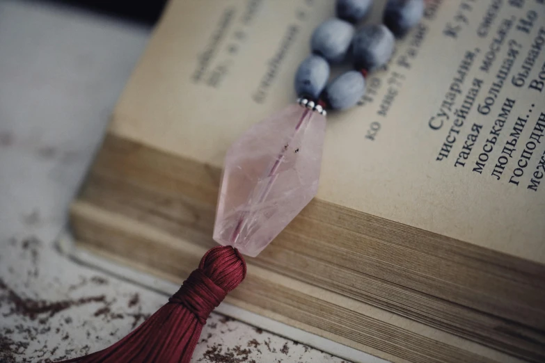 a book with a tassel hanging on it
