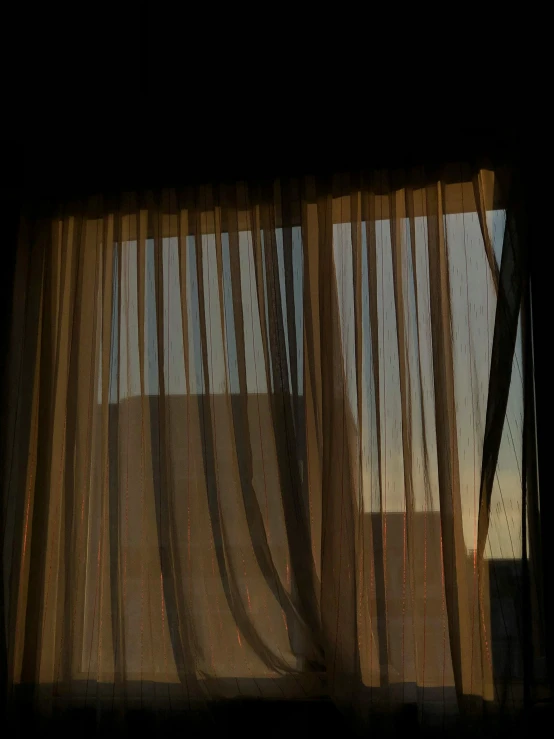 window curtain with no curtains over it looking outside