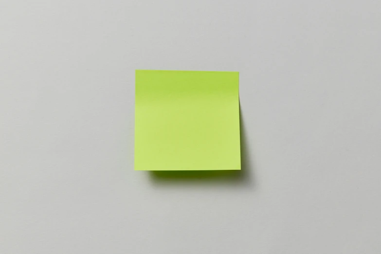 an image of a piece of paper with green sticky notes