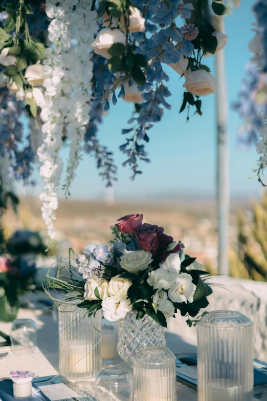 a small centerpiece set on an outdoor table