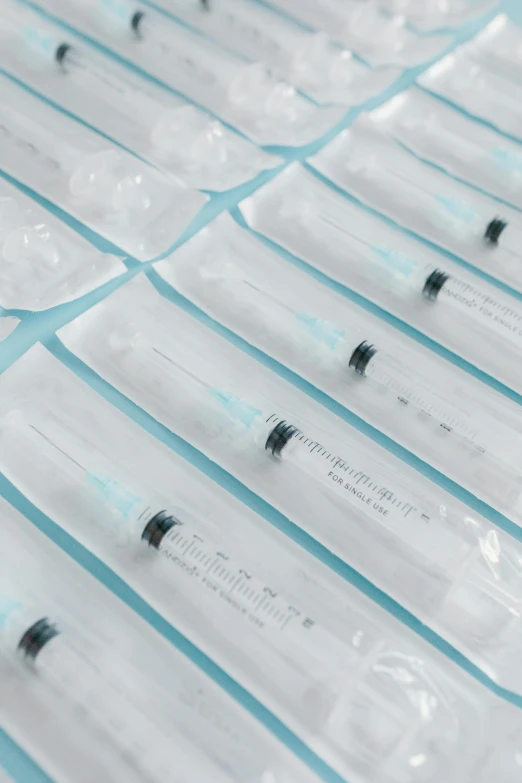 many test tubes with black caps on each side