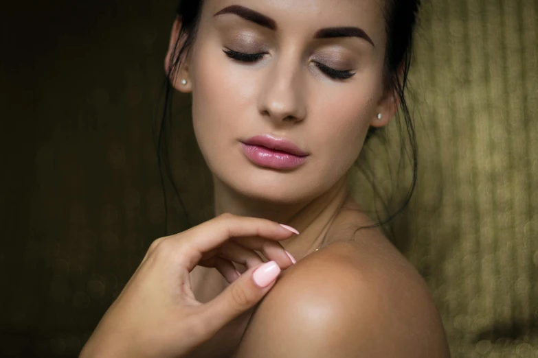 a close - up of a womens face with makeup