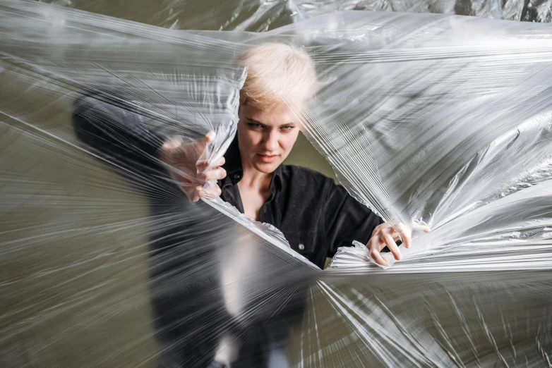 an image of woman in a plastic wrap