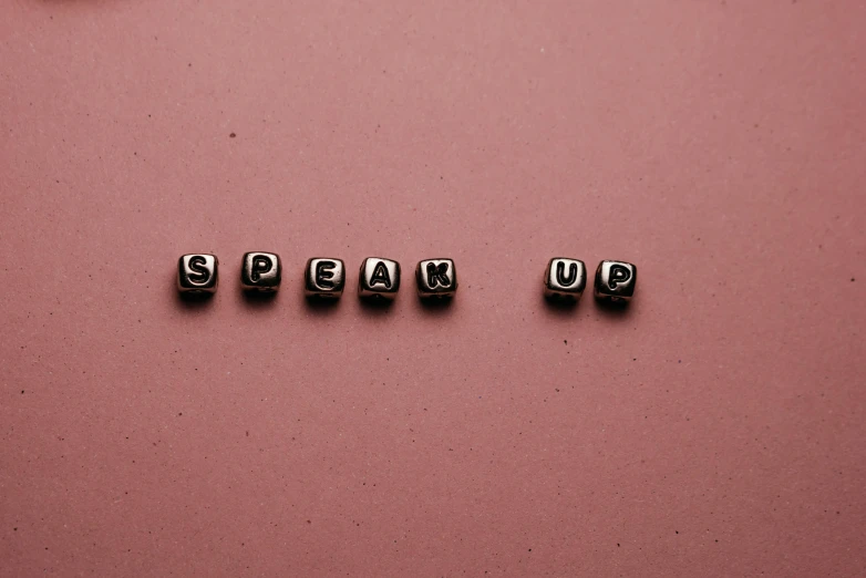 the word spam up spelled with stainless steel letters