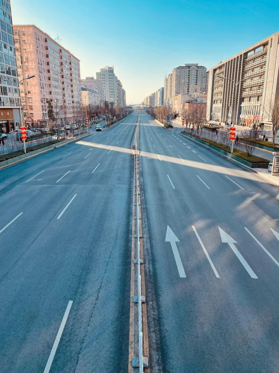 empty street with no cars and some buildings