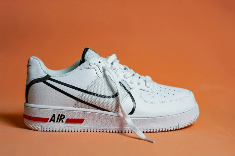 the nike air force 1 low is white with a red stripe