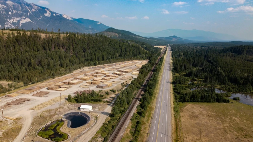 an aerial view of a highway with the highway in the foreground