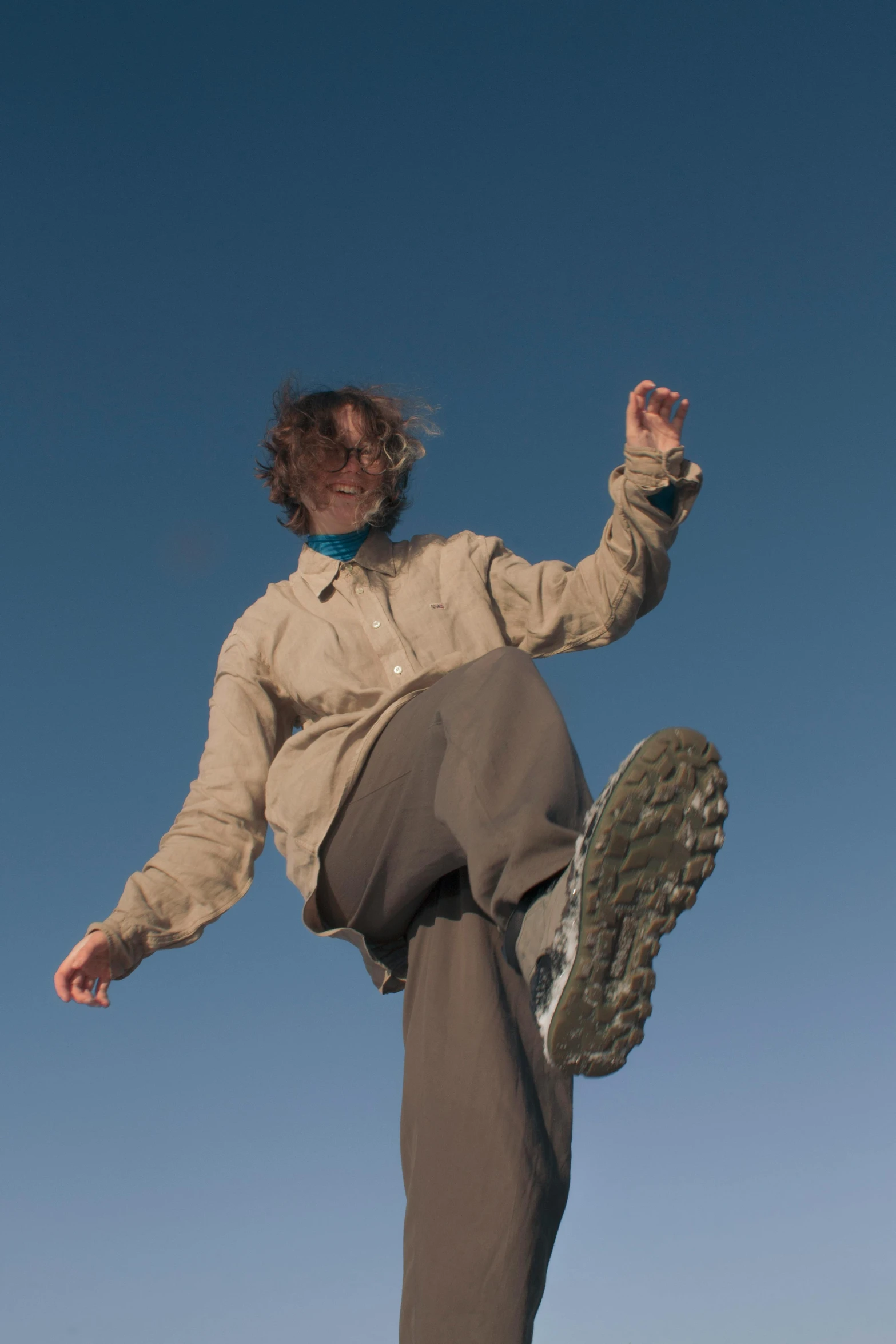 a man is doing tricks on his skateboard