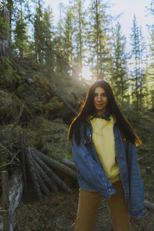 a woman in a blue jacket smiling for a po