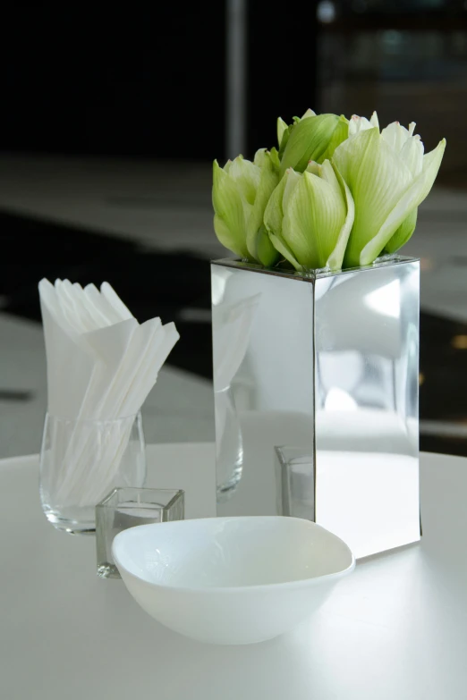 three glass bowls sit on the table in front of each other