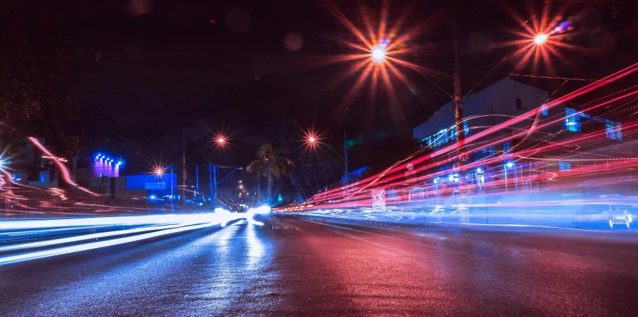 an abstract blurry po of some streets at night