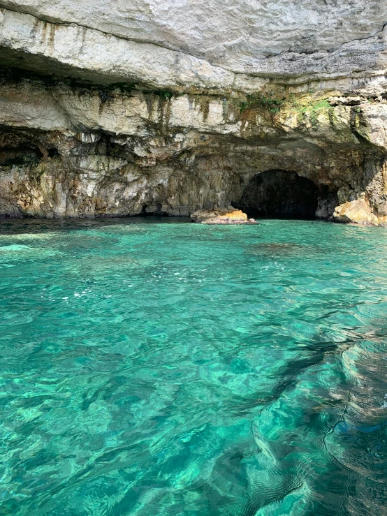 clear blue water and cliffs in an ocean area