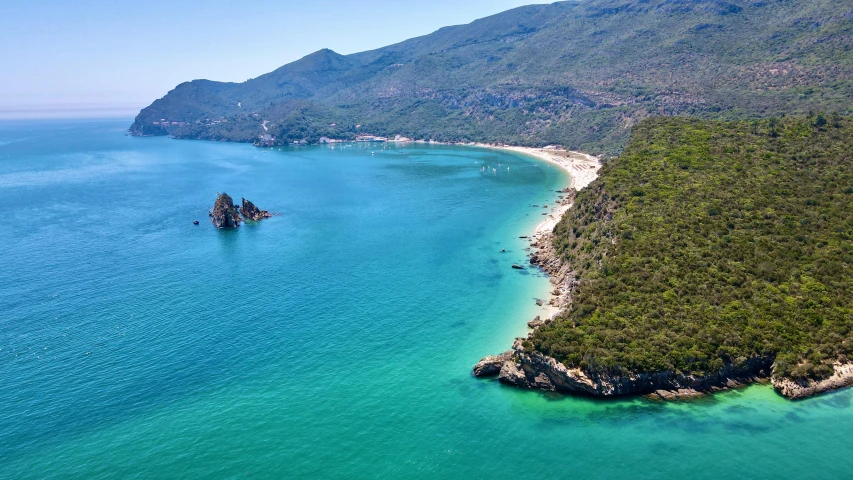 an aerial view of the coastline and ocean